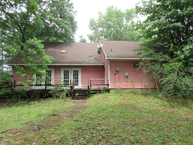 4231 Scenic Dr, Shreveport, LA 71119 - back of property with french doors, a wooden deck, a shingled roof, and a yard