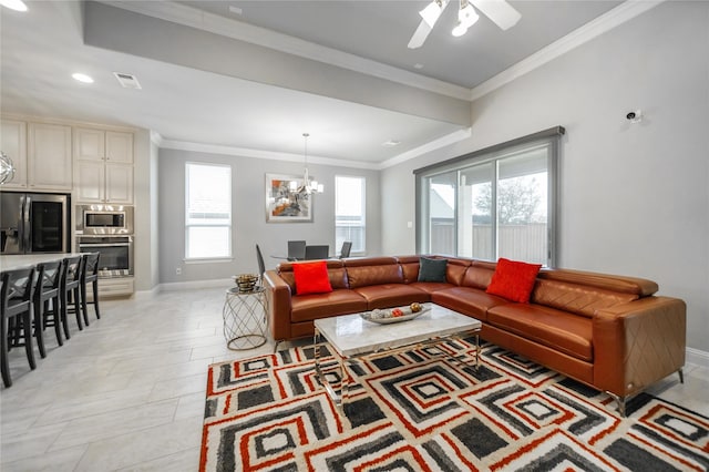 7005 Homestead Dr, Mckinney, TX 75070 - living area with a healthy amount of sunlight, baseboards, crown molding, and visible vents