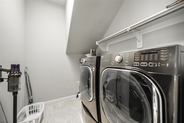 7005 Homestead Dr, Mckinney, TX 75070 - clothes washing area with washing machine and clothes dryer, laundry area, baseboards, and marble finish floor