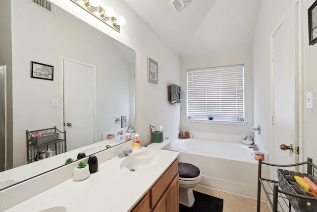 8633 Trinity Vista Trl, Fort Worth, TX 76053 - full bathroom featuring double vanity, toilet, a bath, tile patterned floors, and vaulted ceiling