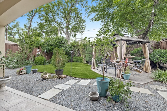 view of yard with a gazebo and a patio area
