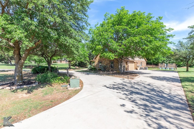 270 Alexandra Dr, Tuscola, TX 79562 - view of property's community with driveway and a garage