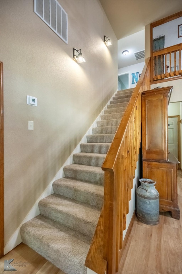 270 Alexandra Dr, Tuscola, TX 79562 - stairway with wood finished floors