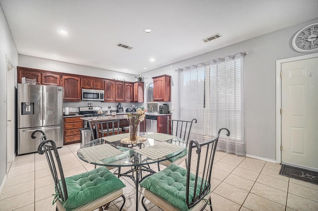 2100 Leandra Ln, Fort Worth, TX 76131 - dining room featuring recessed lighting, visible vents, and light tile patterned floors