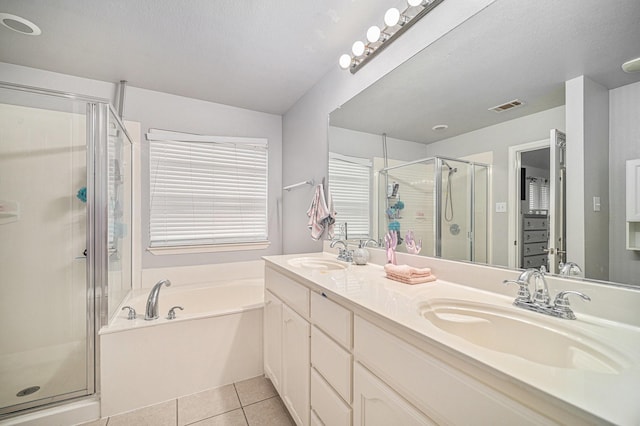 2100 Leandra Ln, Fort Worth, TX 76131 - bathroom with tile patterned floors, visible vents, a sink, and a stall shower