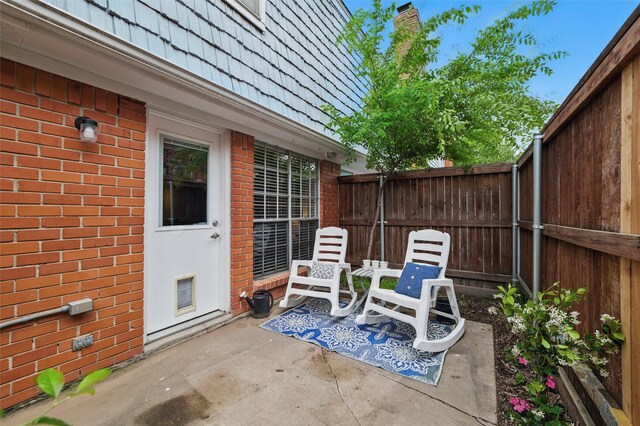 view of patio featuring a fenced backyard
