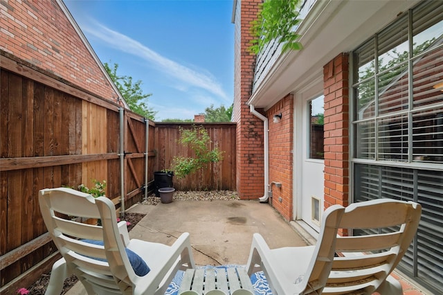 view of patio with a fenced backyard
