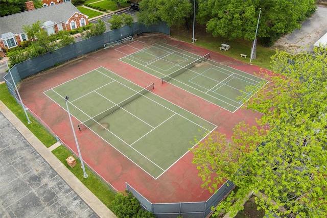 view of tennis court with fence