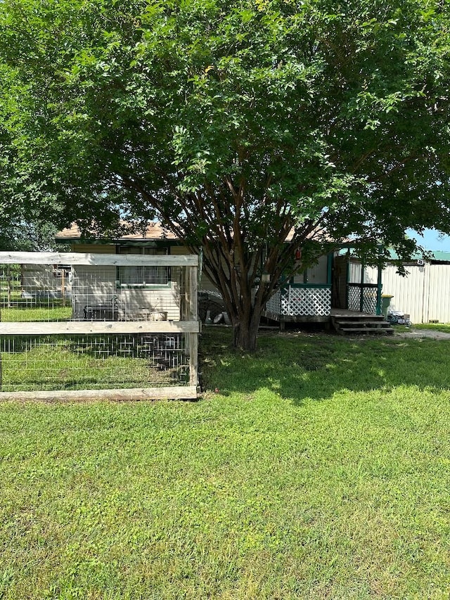 view of yard with fence
