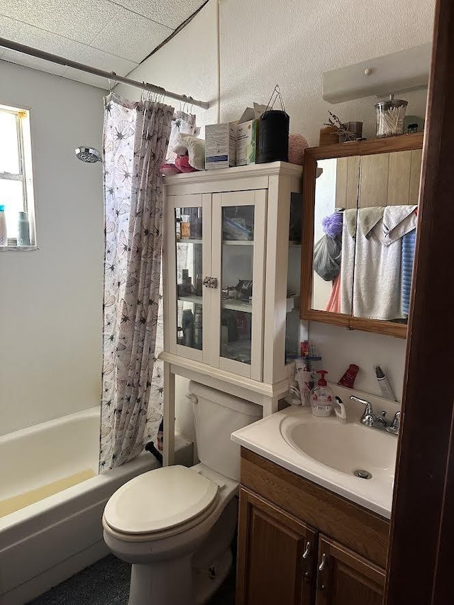 full bathroom with vanity, toilet, and shower / bath combination with curtain