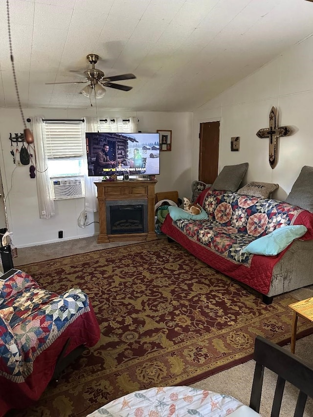 carpeted living area with a fireplace, a ceiling fan, and lofted ceiling