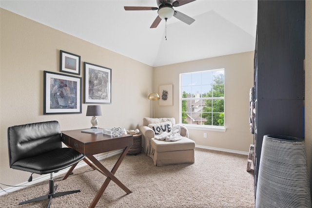 office area featuring baseboards, carpet, ceiling fan, and lofted ceiling