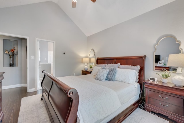 bedroom featuring wood finished floors, baseboards, ceiling fan, and high vaulted ceiling