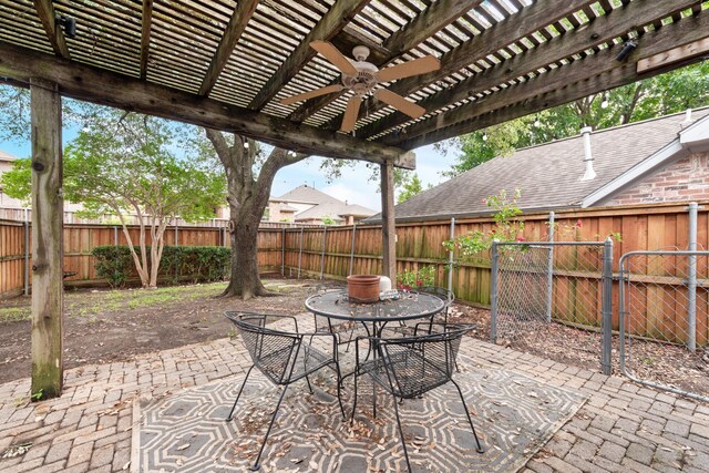 view of patio / terrace with a fenced backyard, outdoor dining area, a pergola, and ceiling fan