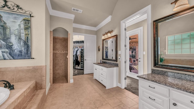 full bath featuring visible vents, vanity, tile patterned floors, a spacious closet, and ornamental molding