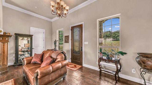 interior space with crown molding, dark wood-style flooring, baseboards, and a notable chandelier