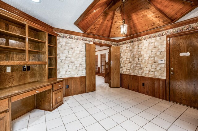 908 Willow Brook Dr, Allen, TX 75002 - unfurnished office with wood walls, ornamental molding, built in study area, a wainscoted wall, and light tile patterned floors