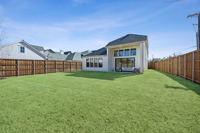 1 Mimosa Pl, Richardson, TX 75080 - back of house with a fenced backyard, stucco siding, an outdoor hangout area, a shingled roof, and a yard
