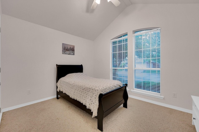 bedroom featuring carpet floors, ceiling fan, vaulted ceiling, and baseboards