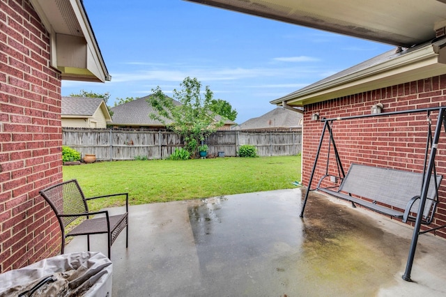 view of patio with a fenced backyard