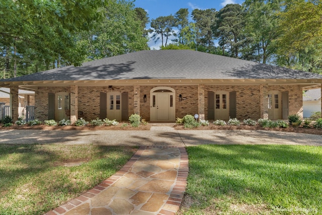 314 Gentilly Cir, Shreveport, LA 71106 - ranch-style home with brick siding, a ceiling fan, roof with shingles, and a front yard