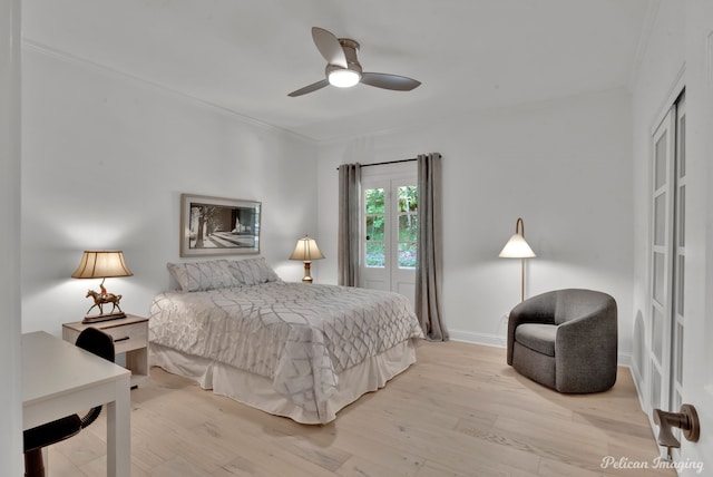 314 Gentilly Cir, Shreveport, LA 71106 - bedroom with baseboards, ornamental molding, light wood finished floors, and a ceiling fan