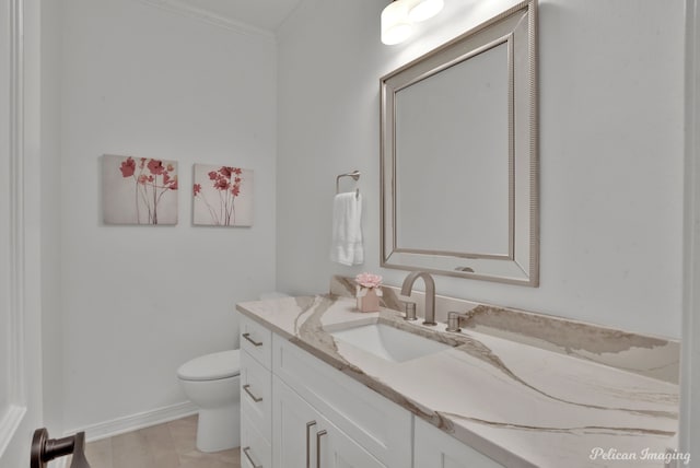 314 Gentilly Cir, Shreveport, LA 71106 - bathroom with vanity, baseboards, crown molding, and toilet