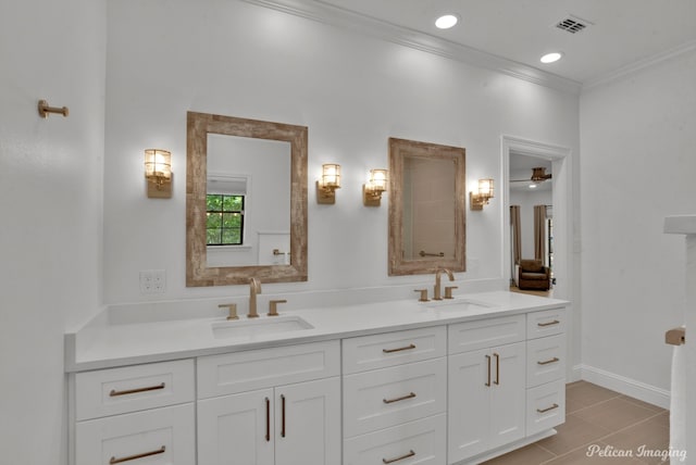 314 Gentilly Cir, Shreveport, LA 71106 - bathroom with a sink, crown molding, double vanity, and visible vents