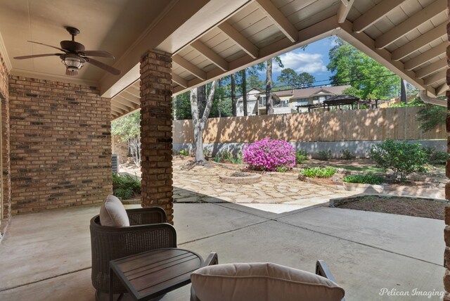 314 Gentilly Cir, Shreveport, LA 71106 - view of patio featuring a ceiling fan and fence