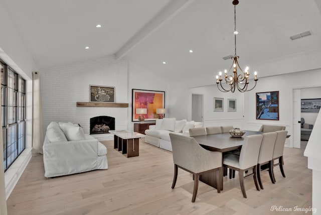 314 Gentilly Cir, Shreveport, LA 71106 - dining space with visible vents, vaulted ceiling with beams, an inviting chandelier, and light wood-style floors