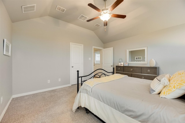 bedroom featuring visible vents, carpet, baseboards, and vaulted ceiling