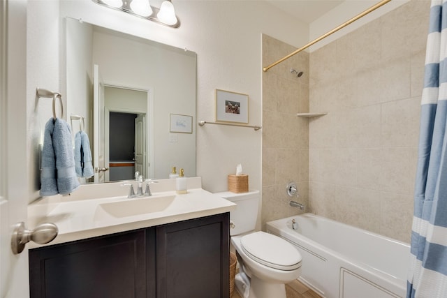 full bath with toilet, shower / tub combo with curtain, and vanity