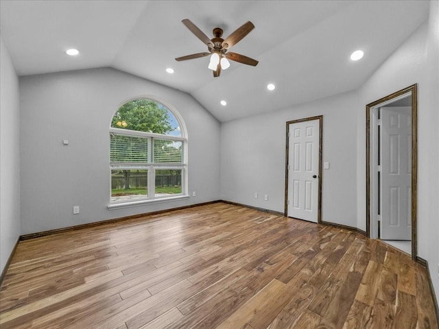 unfurnished room with a ceiling fan, recessed lighting, wood finished floors, and lofted ceiling