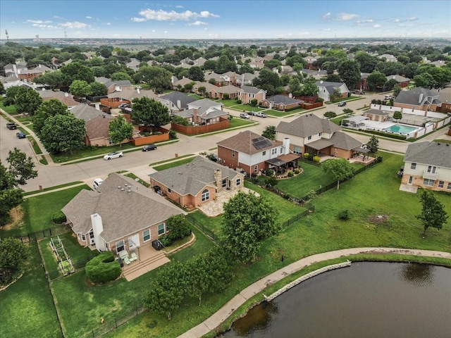 aerial view with a water view and a residential view