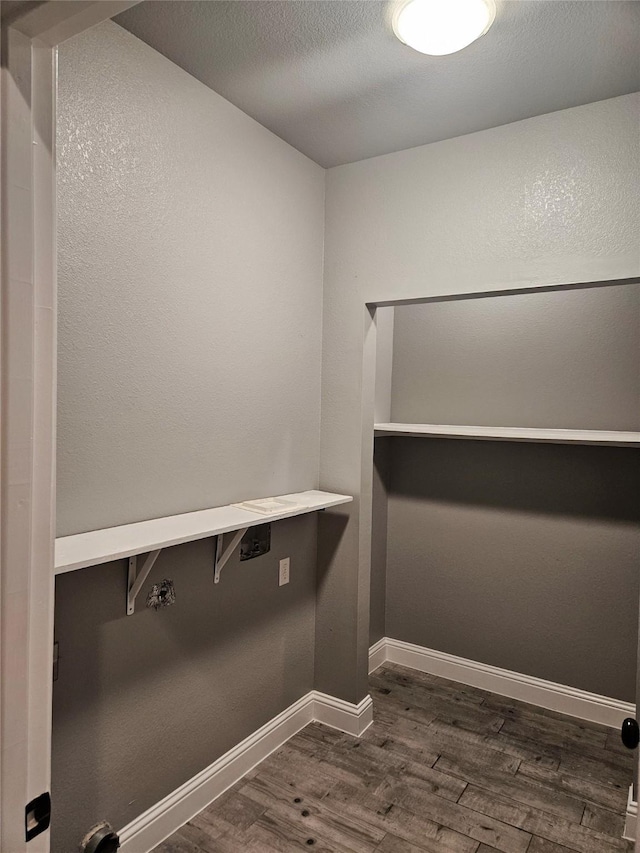 2120 Rw Bivens Ln, Fort Worth, TX 76105 - walk in closet with dark wood-style flooring