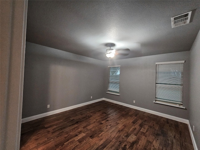 2120 Rw Bivens Ln, Fort Worth, TX 76105 - spare room featuring ceiling fan and dark wood-type flooring