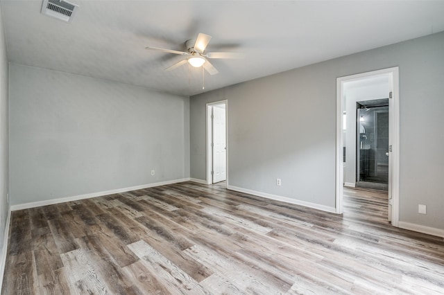 1200 Kesser Dr, Plano, TX 75025 - empty room with baseboards, visible vents, wood finished floors, and a ceiling fan