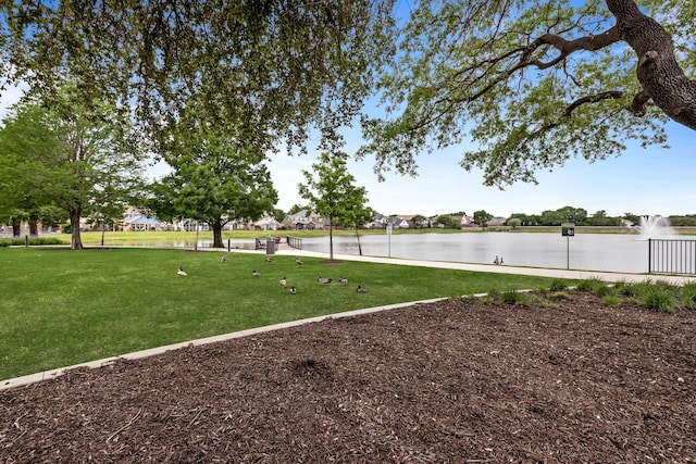 view of yard with a water view
