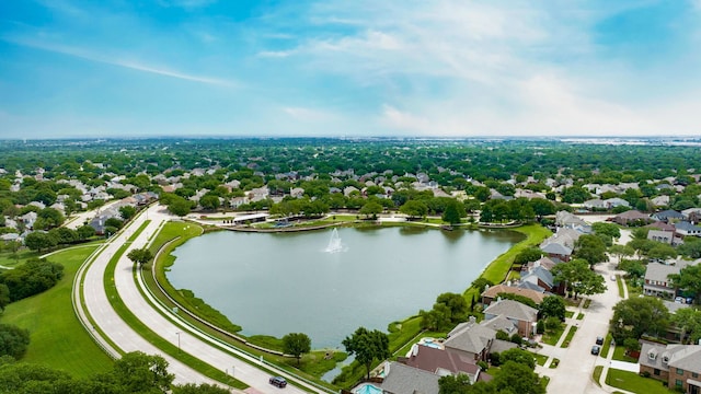 bird's eye view with a water view and a residential view