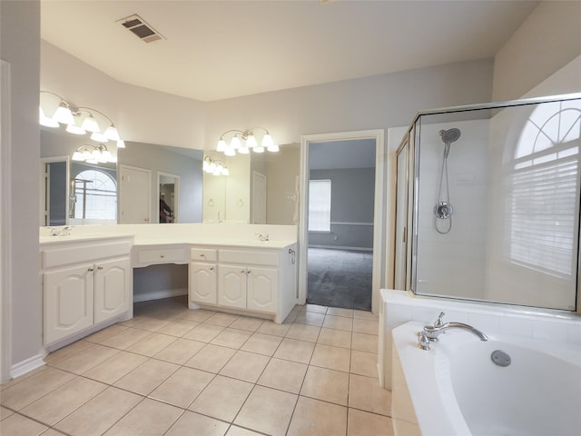 bathroom featuring visible vents, tile patterned flooring, and a healthy amount of sunlight