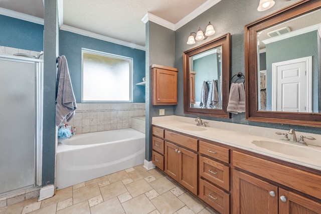 full bath with a sink, ornamental molding, a shower stall, and double vanity