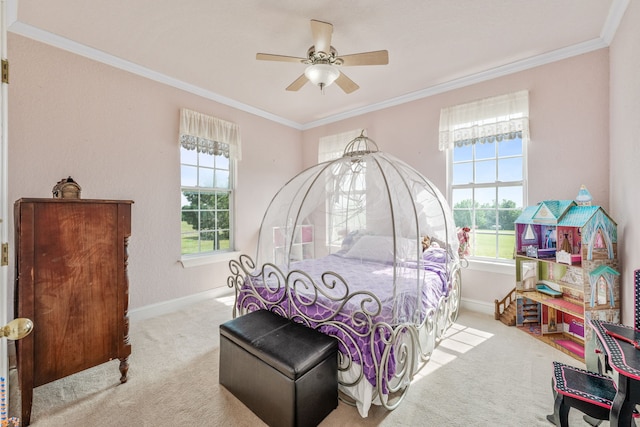 bedroom featuring carpet floors, ornamental molding, baseboards, and ceiling fan
