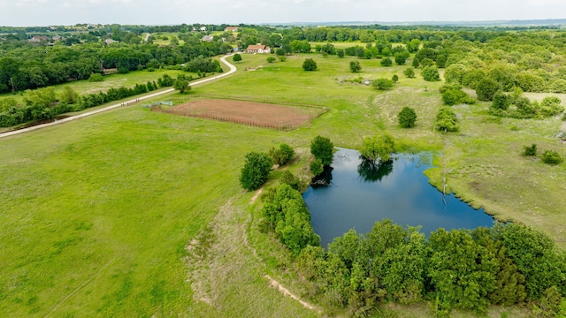 bird's eye view with a water view and a rural view