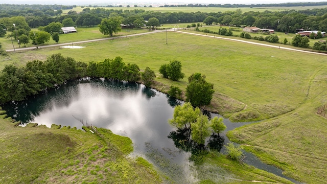 bird's eye view with a water view and a rural view