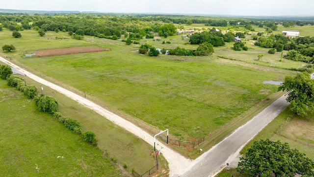 birds eye view of property featuring a rural view
