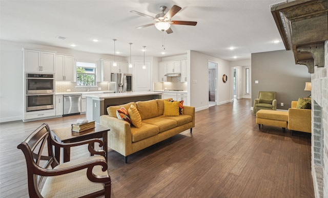 3004 Culver Ave, Celina, TX 75009 - living room featuring baseboards, a ceiling fan, dark wood finished floors, and recessed lighting