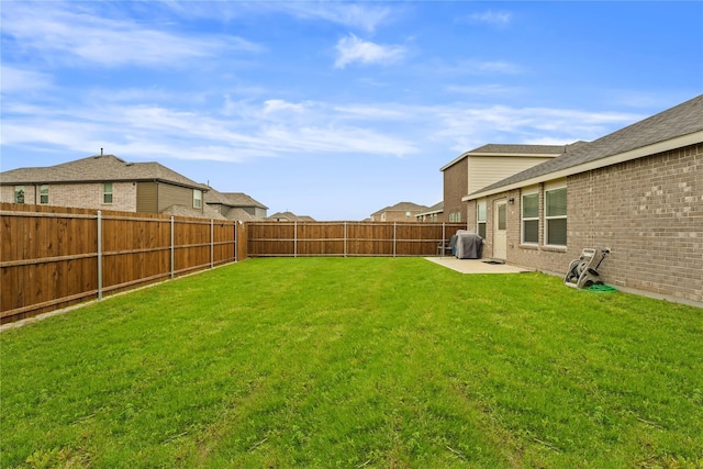 view of yard featuring a fenced backyard and a patio