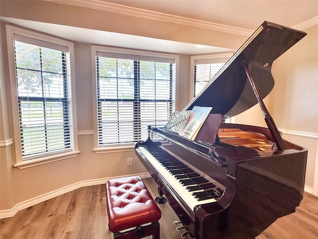 104 W Perry St, Frankston, TX 75763 - living area with baseboards, ornamental molding, and wood finished floors