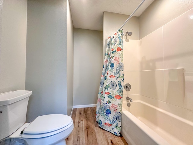104 W Perry St, Frankston, TX 75763 - full bath with shower / tub combo, wood finished floors, and toilet