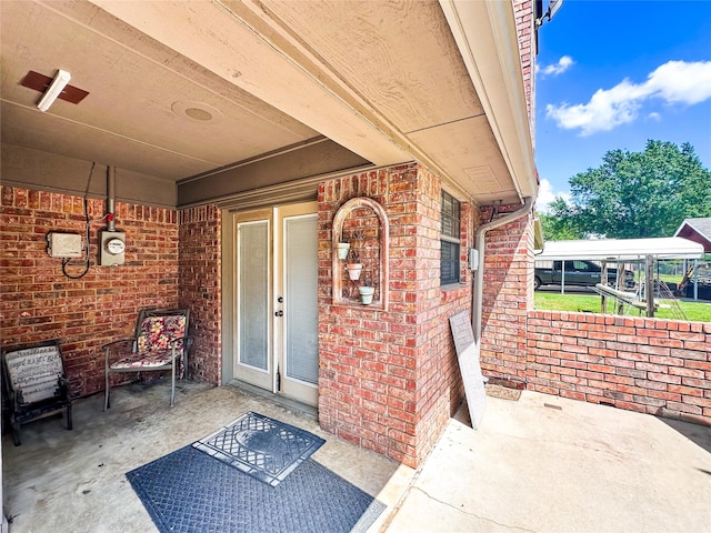 104 W Perry St, Frankston, TX 75763 - entrance to property featuring brick siding and a patio